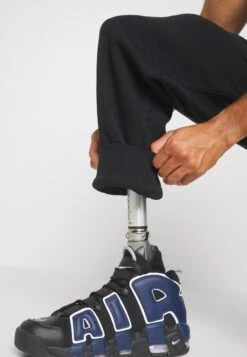 YOURTURN Unisex - Trainingsbroek - Black 16 YOURTURN Unisex - Trainingsbroek - Black -YOURTURN Verkoopwinkel 96890d6b49c24a0ca097867b183abe35